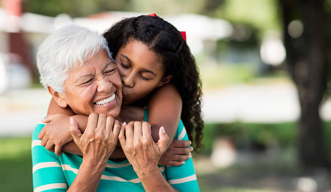 big size - African American grandmother with granddaughter at The Delaney at Georgetown senior living