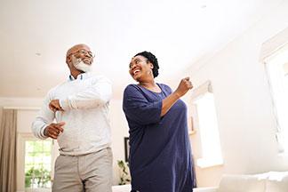 small size image - elderly couple enjoying independent living life at The Delaney at Georgetown