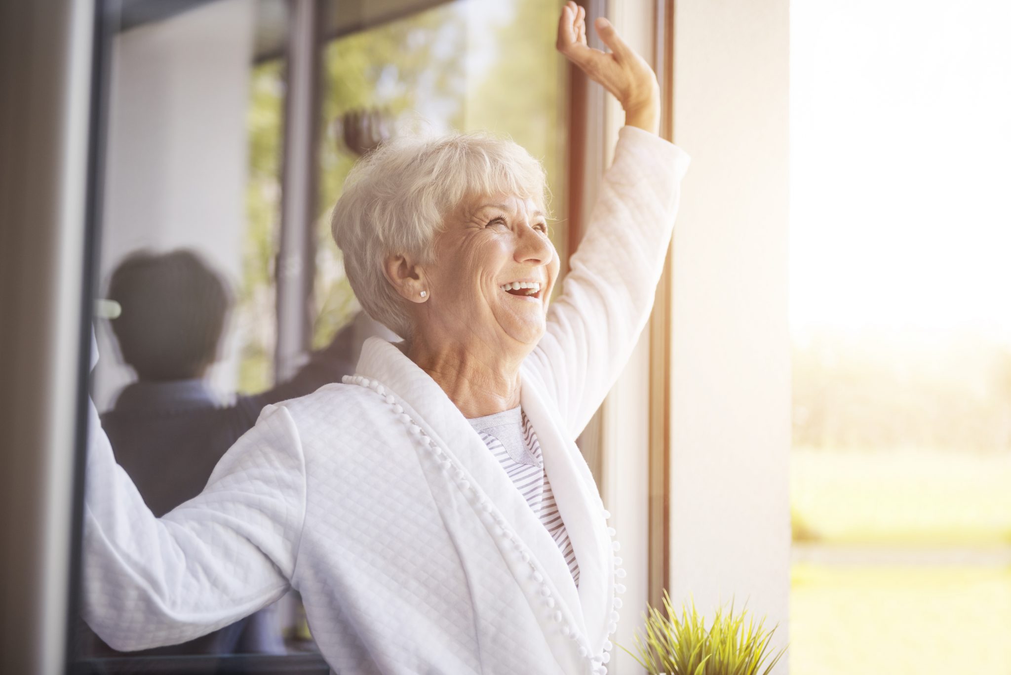 woman smiling in the sunlight