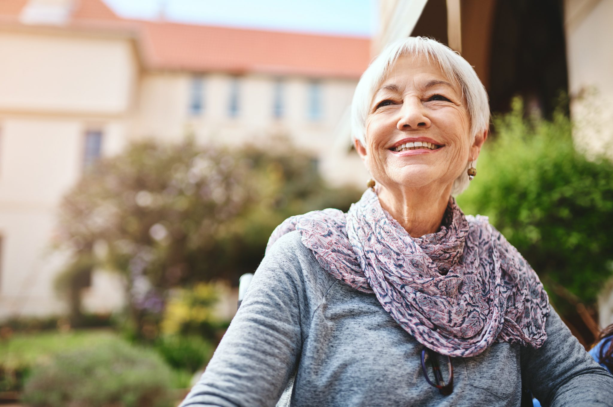 woman smiling in chair