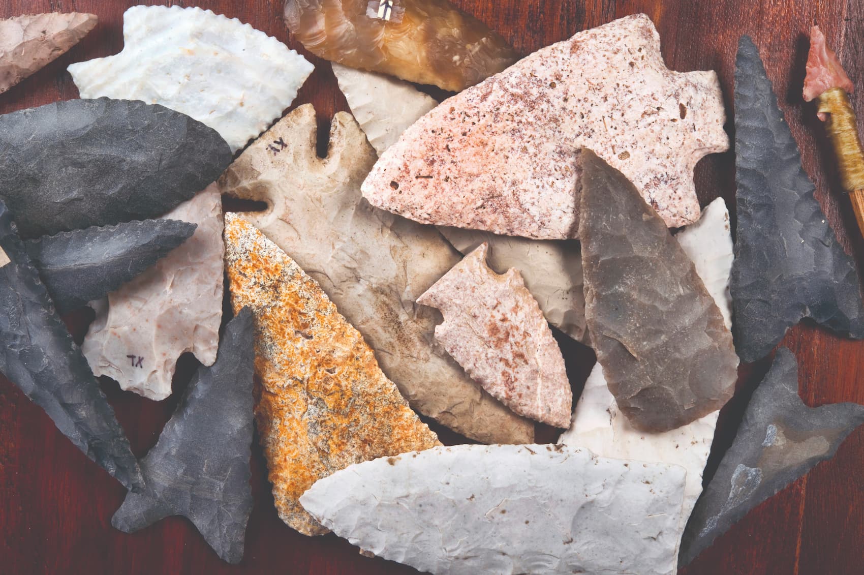 stack of handmade arrowheads