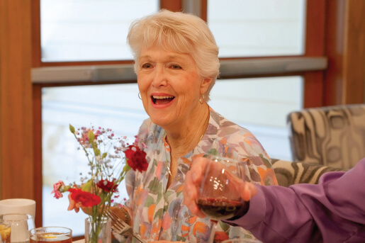 senior woman dining with friends at Georgetown Village